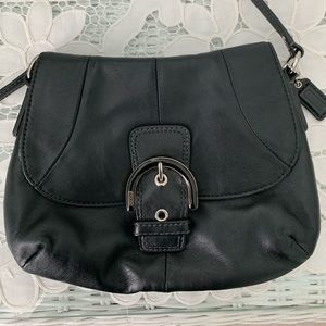 Sharp and versatile coach bag